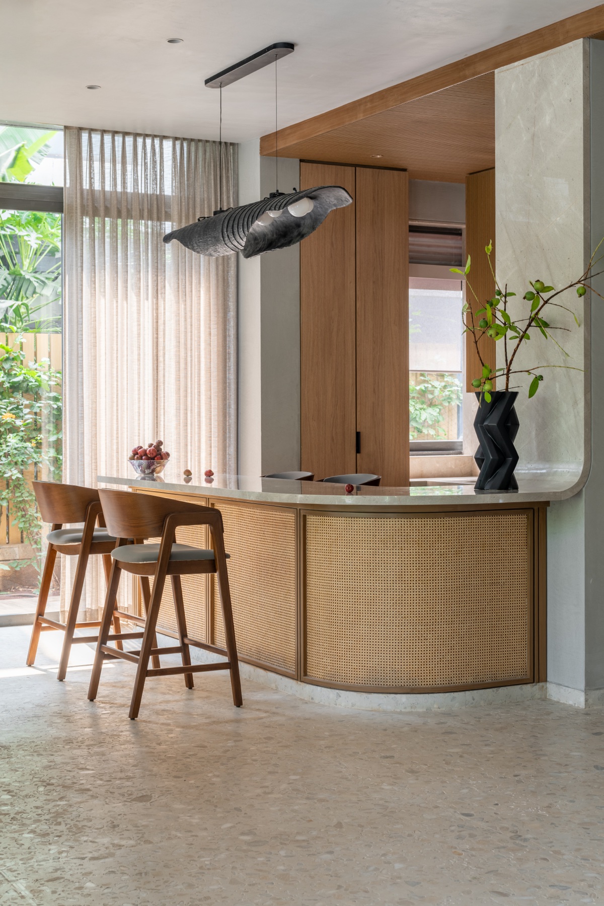 A Shailesh Rajput Studio pendant light installed above a home kitchen counter